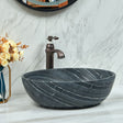 Oval Stone Basin Above Counter Marble Surface