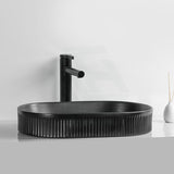 580x360x100mm-oval-above-counter-ceramic-basin-matt-black-basins