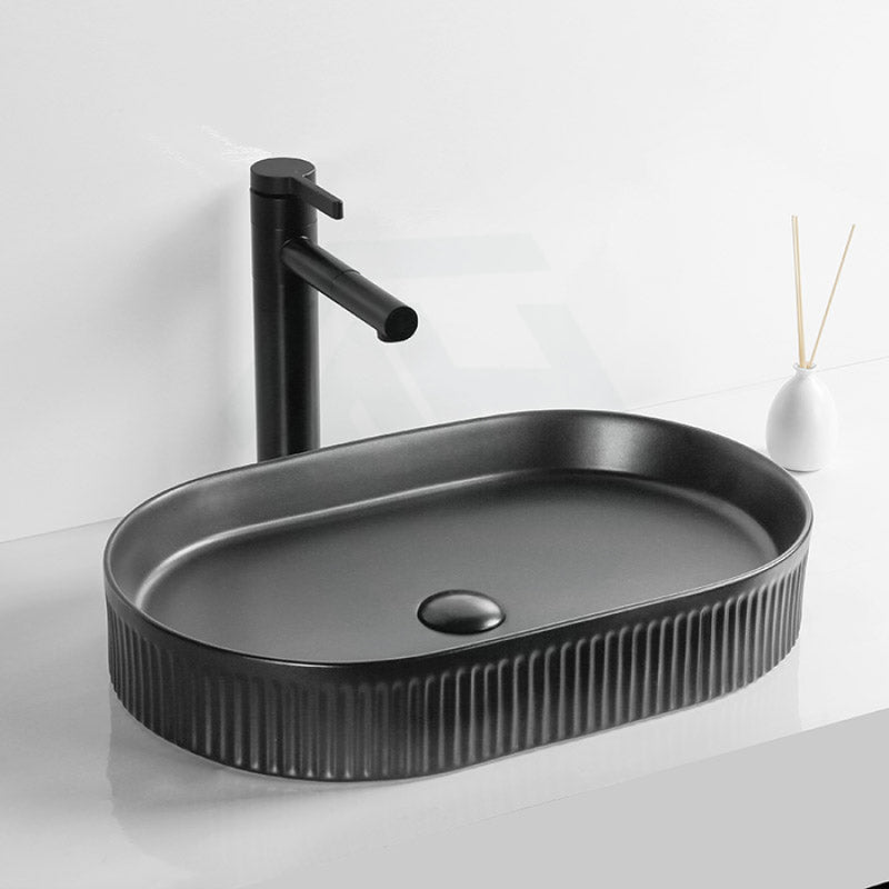 580x360x100mm-oval-above-counter-ceramic-basin-matt-black-basins